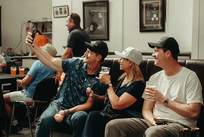 Visitors enjoying a brewery tour at Lacada Brewery in Portrush